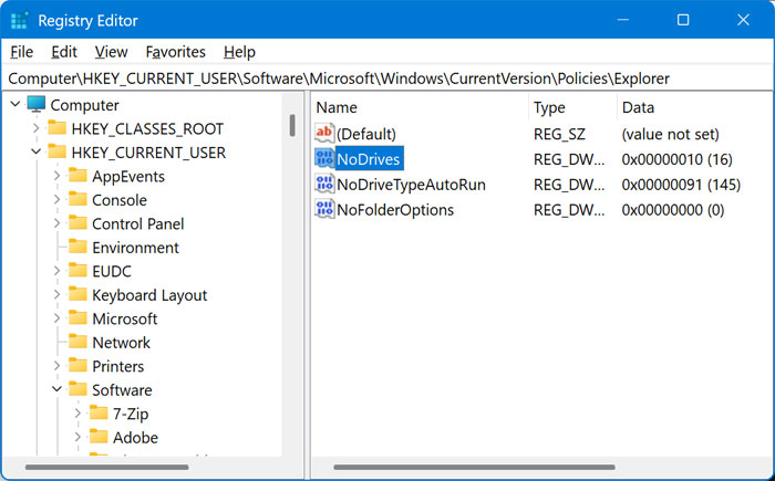 Look for the NoDrives value in the registry